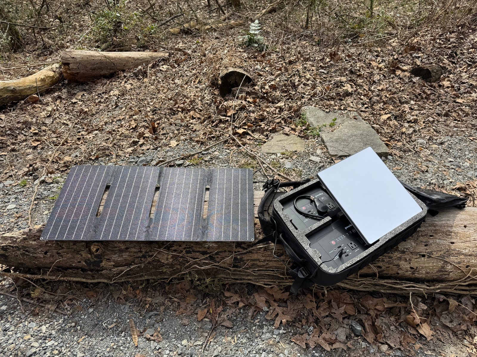 Internet Backpack opened with solar panel and satellite terminal